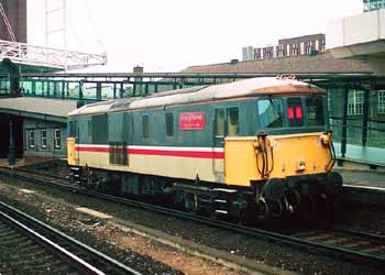 Class 73 locomotive named Woking Homes at East Croydon station.