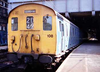 The front of a Class 307 train at London Liverpool Street Station.