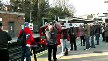 people photographing 1938rs railtour train.
