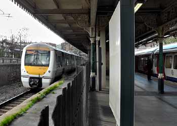 District line and C2C trains at East Ham station.
