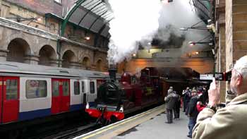 LU150 steam train Paddington station.
