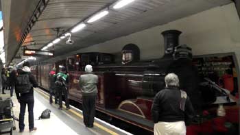 150 years London Underground steam train Kings Cross St Pancras station..